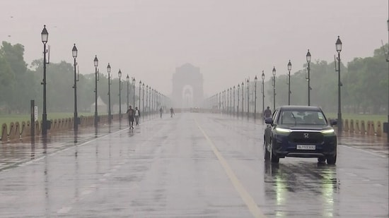 The rain, which brought back a winter-like chill to the capital, came after a brief period of rising temperatures. (ANI Video Grab)