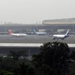 Planes at the Navi Mumbai Airport. Airlines say imposing restrictions on “ancillary revenue”, such as seat-selection fee, “undermines commercial flexibility and interferes with market-driven pricing mechanisms”, in letter to ministry. (Bloomberg Photo)
