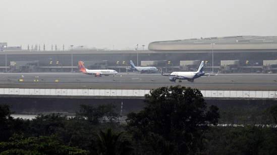 Planes at the Navi Mumbai Airport. Airlines say imposing restrictions on “ancillary revenue”, such as seat-selection fee, “undermines commercial flexibility and interferes with market-driven pricing mechanisms”, in letter to ministry. (Bloomberg Photo)