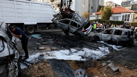 A damaged car is removed following Iranian missile barrage, amid the US-Israel conflict with Iran, in Bnei Brak, Israel March 3, 2026. (Reuters)