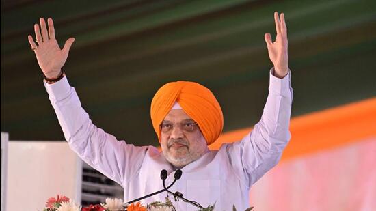 Union home minister Amit Shah addressing the BJP’s Badlav Rally at Killi Chahlan in Punjab’s Moga district on Saturday. (Gurpreet Singh/HT)