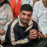 Delhi Minister Ravinder Indraj Singh went to meet the father of 26-year-old man killed in a clash between neighbours during Holi celebrations, in New Delhi on Saturday. (ANI)