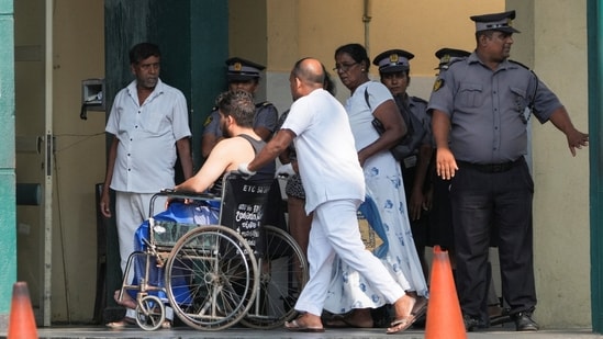An injured person moves on a wheelchair at the National Hospital Galle where he will receive treatment after being injured in an Iranian ship which sounded a distress call off Sri Lanka (REUTERS)
