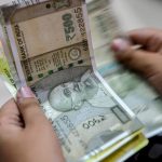 Traders reckon that the Reserve Bank of India will likely step in to avert a sharp slide in the rupee against the US dollar. (PTI)