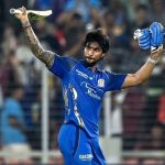 Tilak Varma celebrates after scoring a century (100 runs) during the 2026 IPL match between Gujarat Titans and Mumbai Indians in Ahmedabad (AFP)