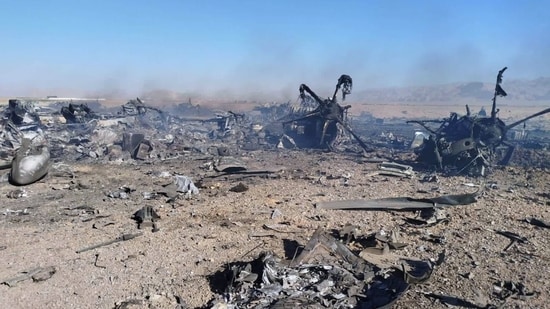 Wreckage is shown at what Iran’s state TV claimed was the site of a downed American transport plane and two helicopters involved in a rescue operation, in Isfahan province, Iran, April 2026. (AP)