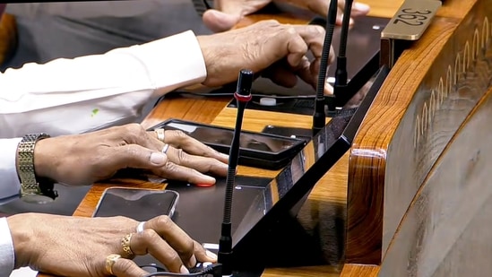 Members vote on the women’s reservation bill in the Lok Sabha during the Special session of Parliament, in New Delhi, Friday, April 17, 2026. Constitution Amendment Bill to tweak women quota law defeated in Lok Sabha after division of votes. (PTI)