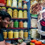 Prime Minister Narendra Modi buys jhalmuri, a street snack, in Jhargram on April 19. (Video grab: X/@narendramodi)