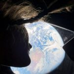 NASA astronaut and Artemis II mission specialist Christina Koch peers out of one of the Orion spacecraft’s main cabin windows, looking back at Earth, as the crew travels towards the Moon, April 2, 2026. (via REUTERS)