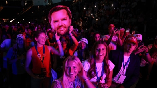 People wait for the start of a Turning Point USA event with Vice President JD Vance at Akins Ford Arena at the Classic Center in Athens, Ga., Tuesday, April 14, 2026. (Chip Somodevilla/Pool via AP) (AP)