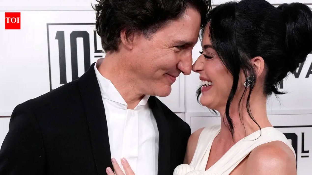 Katy Perry and Justin Trudeau share a passionate kiss on beach date as they mark a year of dating – PICS