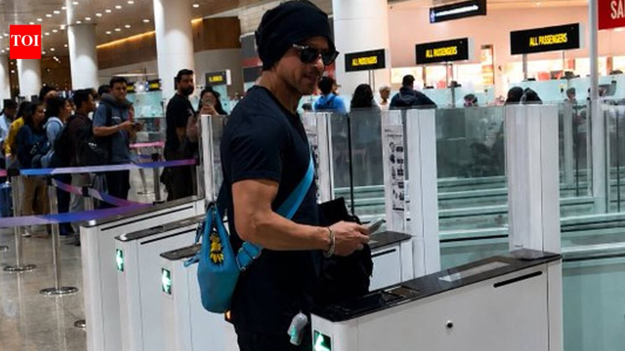 Shah Rukh Khan SPOTTED at London airport; sparks frenzy at immigration counter – WATCH